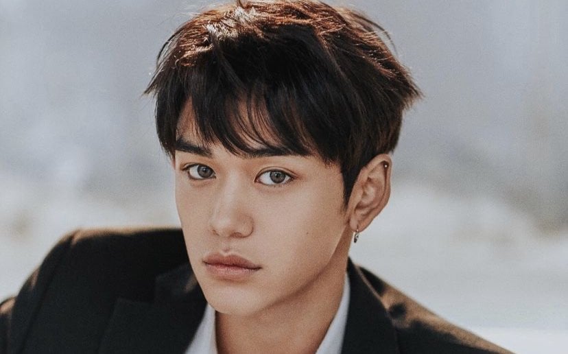 Why did SM Entertainment accept Lucas after his private life controversy?